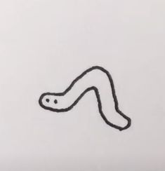 a black and white drawing of a worm