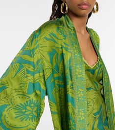 Erica floral kaftan in green - Poupette St Barth | Mytheresa Bohemian Green Sets For Spring, Bohemian Green Spring Set, Beach Green Floral Print Sets, Beach Green Floral Print Set, Printed Silk Sets For Summer, Elegant V-neck Beach Set, Summer Floral Print Rayon Set, Green Tropical Beach Sets, Tropical Green Vacation Sets