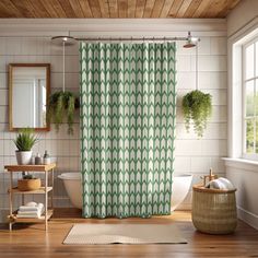 a bathroom with a green shower curtain next to a toilet