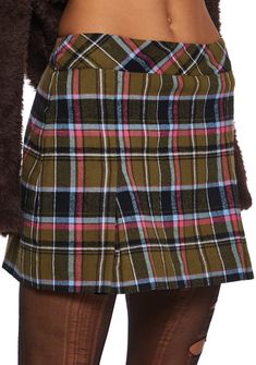 because you're totally unique. This mini skirt has an a-line design, a high rise waist, slits up the front, and a plaid pattern all over. Trendy High Waist Plaid Skort, Trendy High-waist Plaid Skort, Plaid Pleated Short Skort, Plaid Pleated Skort, Preppy Short Mini Skirt For Fall, Preppy Plaid Mini Skirt Bottoms, Preppy Plaid Mini-length Bottoms, Preppy Plaid Mini Length Bottoms, Preppy Mini Length Bottoms For Fall