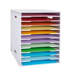 a multicolored file cabinet with six sections on each side and five different colored folders in the bottom drawer