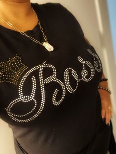 Boss with queen crown rhinestone t shirt. Available in black or white regular unisex shirt. Black Rhinestone T-shirt For Party, Black T-shirt With Rhinestones For Party, Party T-shirt With Rhinestones And Short Sleeves, Rhinestone Embellished Short Sleeve T-shirt For Night Out, Graphic Tee With Rhinestones And Crew Neck, Black Crew Neck T-shirt With Rhinestones, Rhinestone T Shirt, Boss Tshirt, Bling Shirts