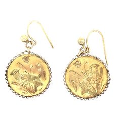 A rare and stunning pair of 9ct gold earrings, in the shape of a coin with a fluted edging. These beautiful earrings date from the late 180s (the wire hooks are a later replacement). The earrings feature a delicate engraving of a bird and flowers to the front, with a plain back. Details Size: Length 1.6cm diameter Weight: 1.7g Age: Victorian   Materials 9ct gold (not hallmarked but tests as 9ct gold)   Condition Notes Good antique condition - some signs of wear to rear of the earrings Antique Engraved Drop Earrings, Victorian Engraved Yellow Gold Earrings, Victorian Style Engraved Yellow Gold Earrings, Victorian Engraved Earrings For Formal Occasions, Antique Yellow Gold Brass Earrings, Antique Gold Engraved Earrings, Victorian Engraved Earrings For Gifts, Victorian Yellow Gold Earrings With Screw Back, Vintage Brass Earrings With Engraving