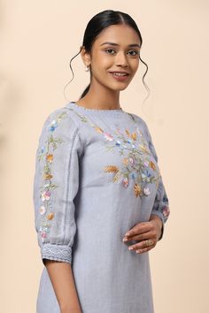 Buy Blue Linen Embroidery Thread Boat Dress For Women by Kaveri Online at Aza Fashions. Embroidered Light Blue Cotton Dress, Light Blue Embroidered Cotton Dress, Blue Cotton Dress With Floral Embroidery, Festive Light Blue Embroidered Dress, Blue Cotton Dress With Embroidered Hem, Blue Fitted Floral Embroidered Top, Light Blue Long Sleeve Dress With Floral Embroidery, Blue Embroidered Dress With Embroidered Sleeves, Long Sleeve Blue Dress With Embroidered Neckline