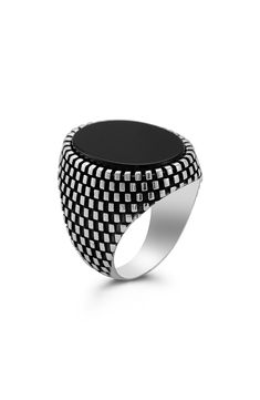 An intricately detailed design on a classic signet ring will be worn on endless repeat. Sterling silver/rhodium plate/onyx Made in Turkey Modern Silver Signet Ring With Black Enamel, Formal Silver Signet Ring With Black Enamel, Elegant Silver Stainless Steel Signet Ring, Classic Stainless Steel Signet Ring For Formal Occasions, Modern Black Engraved Rings, Classic Oval Stainless Steel Rings, Elegant Stainless Steel Signet Ring For Formal Occasions, Silver Onyx Signet Ring, Onyx Signet Ring