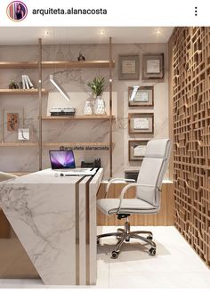 an office desk with a laptop computer on it in front of a book shelf and shelving