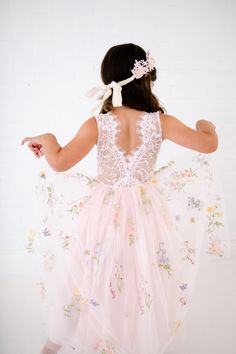 This stunning dress is a beautiful vintage inspired look...perfect for any little girl and occasion! This blush pink  dress has a boho flair and a super feminine feel with the soft vintage inspired lace. This tulle skirt is complete with embroidered florals and butterflies. The V back with unfinished lace and hem creates the perfect amount of bohemian vibes. Nicolette's Couture is a family owned boutique based out of Dubuque, Iowa.  When creating looks, comfort is our main priority...regardless of how chic a style is. We've had amazing success so far and believe our story is just beginning. The future looks bright for Nicolette's, and we're eager for you to hop on board and experience our brand's benefits.  Pair It With A Nicolette's Hairpiece:  https://www.etsy.com/shop/NicolettesCouture? Rustic Blush Pink Wedding, Lace Flower Girl Dress Rustic, Butterfly Dresses, Blush Pink Wedding Dress, Dubuque Iowa, Lace Flower Girl Dress, Blush Pink Wedding, Blush Pink Dresses, Pink Wedding Dress