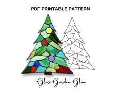 a stained glass christmas tree sitting on top of a white background with the words printable pattern