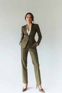 This sophisticated Sage Green Single Breasted Suit is crafted from high-quality fabric and premium imported materials. Each suit is expertly handcrafted by our skilled tailors, ensuring precise stitching, a well-structured lining, and durability that maintains its shape for years. With extra margins in the length, sleeves, and sides, this suit is easily alterable for a perfect fit, even if your size changes over time. Explore more color options and designs in our 'Single Breasted Suits' section. * This is a 2-piece set, consisting of a jacket and trousers.   * We offer full customization for a tailored fit. Just send us your measurements (Chest, Stomach, Waist, Hip, Shoulder, and Height) after placing your order.   * Interested in a different style or color? Reach out to us, and we'll work Sage Green Suits Women, Sage Suit Women, Trouser Suits For Women Classy, 3 Piece Suits For Women, Women Suits Business, Woman Wearing Suit, Suit For Women Formal, Court Outfits, Green Suit Women