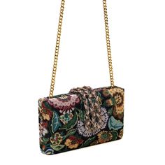 Immerse yourself in the lush elegance of the Bagh Braided Fringe Clutch, a breathtaking masterpiece from our Anar Edit collection. 'Bagh' translates to 'garden' in Hindi, and this clutch embodies the essence of strolling through an enchanting botanical garden. Crafted from rich woven jacquard fabric in deep green, adorned with intricate flora and fauna, this piece is a celebration of nature's artistry. The braided crystal closure clasp adds a touch of sparkle, reminiscent of dew-kissed flowers. Simitri Styling Tips: Perfect for vacations, galas, and every exquisite event in between, the Bagh Braided Fringe transforms any outfit into a statement of refined luxury. Pair it with a flowy summer dress for a garden party or elevate your evening attire with its lush, inviting charm. Composition C Traditional Multicolor Clutch For Formal Occasions, Elegant Multicolor Clutch For Formal Occasions, Elegant Multicolor Evening Clutch, Elegant Multicolor Formal Bags, Handmade Multicolor Evening Bag For Formal Occasions, Luxury Multicolor Rectangular Clutch, Luxury Multicolor Clutch, Chic Multicolor Evening Bag For Formal Occasions, Chic Multicolor Evening Bag For Formal Events