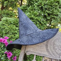 Witching Hour is Coming! Is your little one ready? Gray felt is covered with black spider web lace on this spooky hat. It's the perfect accessory to complete your favorite trick-or-treater's Halloween costume! The toddler-sized hat fits ages 2-6 years old and comes with a strap that goes around your little witch's head to help keep it in place as they zoom through the night. Gothic Black Hat For Fall, Spooky Black Costume Hat, Fitted Black Witchy Hat, Black Fitted Witchy Hat, Spooky Black Costume Hats And Headpieces For Halloween, Black Witchy Hat For Halloween, Witchy Black Brimmed Costume Hat, Black Witchy Brimmed Costume Hat, Black Brimmed Witchy Costume Hat