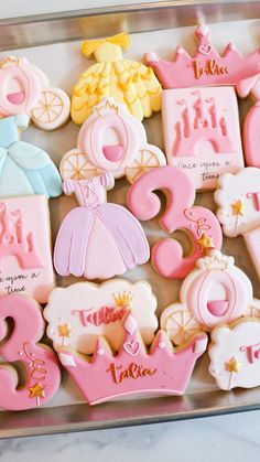 decorated cookies in the shape of princess's tiaras