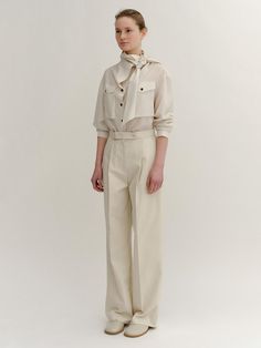 The basic wide pants that made of cotton blended material. Featuring the belted waist, side pockets, and the tuck detail at legs. Style with t-shirts, blouse, or shirts to create minimal daily looks. - High-waisted design with cinch tab and press stud- Zipper closure at front- Oblique pockets at side seam- Tuck detail at legs- Wide leg silhouette and maxi length Relaxed Fit Paperbag Waist Workwear Pants, Relaxed Fit Paperbag Waist Pants For Work, Belted Wide Leg Paperbag Waist Pants For Work, Chic Wide Leg Paperbag Waist Pants For Work, Belted Relaxed Fit Pants For Work, Cotton Workwear Pants With Belted Cuffs, Cotton Work Pants With Belted Cuffs, Workwear Paperbag Waist Pants With Belted Cuffs, Cotton Paperbag Waist Pants For Work