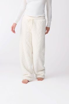 Lounge in style with our ivory cable-texture cozy pant. It features a rib tie-waistband, side welt pockets, and straight-leg styling for ultimate in cozy comfort. Cozy Fit Pants With Soft Texture, Cozy Cable Knit Bottoms For Loungewear, Cable Knit Bottoms For Fall Loungewear, Cozy Cable Knit Loungewear Bottoms, Cozy Pants, Cozy Lounge, Spring Set, Leisure Time, Lounge Shorts