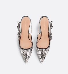 The J'Adior slingback pump is a prime example of Dior's savoir-faire. The white and black embroidered cotton style showcases the season's signature Plan de Paris motif, inspired by House archives and centered around Dior's historic address on Avenue Montaigne. The J'Adior signature embroidered ribbon, bow and 6.5 cm (2.5) comma heel complete the elegant shoe, which can be paired with other Plan de Paris creations.. 38.5 Plan Paris, Dior Star, Embroidered Ribbon, Icon Shoes, Dior Sandals, Ballerina Pumps, Dior Book Tote, Christian Dior Couture, Dior Couture