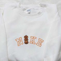 Nike x Pumpkin Horror Embroidered Sweatshirt, Nike Inspired Embroidered Shirt, Best Halloween Gift Ideas White Embroidered T-shirt For Fall, Long Sleeve Tops With Machine Embroidery For Streetwear, White T-shirt With Embroidered Text For Fall, Halloween White Sweatshirt With Embroidered Graphics, White Halloween Sweatshirt With Embroidered Graphics, Halloween White Embroidered Sweatshirt, White Custom Embroidered Top For Halloween, Custom Embroidered White T-shirt For Fall, White Custom Embroidered T-shirt For Fall