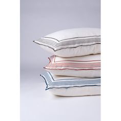 four pillows stacked on top of each other