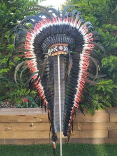 Long Indian Headdress Replica made with Brown Swan feathers and Rooster feathers beaded work in the front This great adult headdress is entirely handmade and truly adorable. Perfect photography prop for your special ocasion. Ties in the back for a perfect fit. This will be precious for your costume, or even room decor. Head circumference: 59 centimeters / 23 inches ✈️ Worldwide shipping 🐤 I only use authentic feathers ⛺️ I guarantee highest quality, 100% hand-crafted Festival Ostrich Feather Trim Headpiece, Festival Headpiece With Ostrich Feather Trim, Ostrich Feather Trim Headpieces For Festivals, Native American Wedding Dress, Swan Feathers, Native American Wedding, Native American Headdress, Feather Fashion, Beaded Work