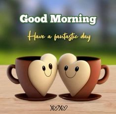 two coffee cups with hearts on them are sitting in front of the words good morning have a fantastic day