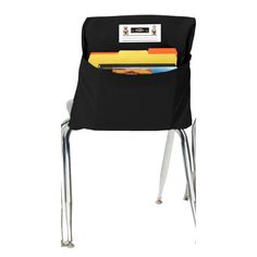 a stack of folders sitting on top of a metal chair with a black seat