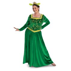 a woman in a green dress with horns on her head and hands out to the side