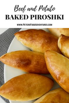 some bread is on a white plate with the words beef and potato baked proshiki