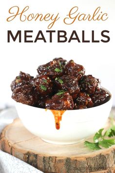 honey garlic meatballs in a white bowl on top of a wooden board with text overlay