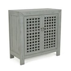 a grey cabinet with lattice design on the front and sides, against a white background