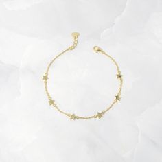 "Beautiful and delicate star charm anklet is great for stacking, beach days, and just to elevate your look! The anklet was made with an attention to detail, it's super high quality and meant to last!  - - - D E T A I L S - - -  * Made of 925 Sterling Silver * THICK plating of 14k Gold or Rhodium - for a piece that will last you years to come!  * 9\" + .5\" Extension Chain * Nickel-free & Hypoallergenic  * Able to be worn to the beach & pool! * Lobster clasp closure * 5mm Charm Made with 100% Pure Love! ♡ Comes in a gift-box, ready for gift-giving! 🎁 Let's Connect! 🥰 IG: samijewels_" Dainty Star Bracelet, Star Bracelet Gold, Quince Jewelry, Minimalist Anklet, Star Charm Bracelet, Dream Wishlist, Star Anklet, Charm Anklet, Preppy Jewelry