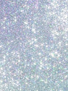 an abstract background with many small stars in the sky, like snow flakes or sparkles