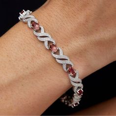 Add Glitz And Glam To Your Party-Ready Ensemble With This Chain Bracelet Highlighted By Diamonds And Colored By Garnets. Hinge With Tongue-And-Groove Closure And Safety Clasp Total Diamond Weight: 0.20ct. Total Garnet Weight: 4.00ct. Rhodium Plate/Garnet/Diamond Imported Multi Chain Bracelet, Fendi Bracelet, Brighton Earrings, Cz Bracelet, Earring Trends, Garnet Bracelet, Beaded Wrap Bracelets, Brighton Jewelry, Tongue And Groove