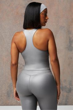 Anywhere Shine Built-In Bra Tank Fabletics Gunmetal Grey Shine female Activewear >> Womens >> Tops >> Tanks regular Training Metallic Fitted Activewear For Sports, Metallic Fitted Gym Activewear, Metallic Fitted Workout Activewear, Metallic Fitted Athleisure Activewear, Metallic Stretch Activewear For Sports, Sporty Metallic Activewear For Sports, Silver Stretch Activewear For Athleisure, Silver Stretch Athleisure Activewear, Fitted Silver Activewear For Sports