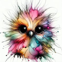 an owl is painted with colorful paint and splats on it's face