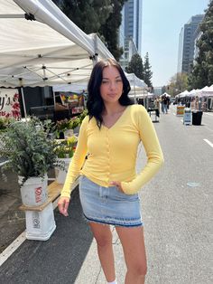 Add a pop of sunshine and color to your closet. The vibrant yellow color instantly brightens up any outfit, whether you're heading to brunch with friends or running errands around town. With its open-front design and relaxed fit, it's easy to layer over a simple tee or tank top. Mckenna is wearing a size Small. Yellow Tee Outfit, Brunch With Friends, Yellow Tees, Simple Tees, Satin Slip, Satin Slip Dress, Satin Skirt, Tee Outfit, Front Design