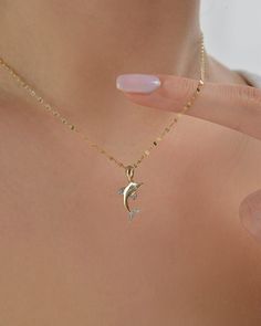 Material: Gold Carat: 14K (585) Solid Gold   14k Gold Dolphin Pendant, Dolphin Chain Necklace, Sequin Chain Necklace, Small Dolphin Charm Pendant, Necklace Gifts for Her, Birthday Gifts for Her  Ring Details 14K Solid Gold Plated is not gold it is real solid gold Gold Color Options; Yellow Gold, White gold, Rose Gold, - All products are made to order in Turkey. - This product is sleek and stylish. It is produced carefully to make you and your loved ones happy. Prepared with love and experience. Gold Plated White Gold Chain Necklace For Anniversary, White Gold Plated Chain Necklace For Anniversary, Gold Plated 14k Stamped Chain Necklace Gift, Gold Plated Chain Necklace Stamped 14k For Gift, Yellow Gold Chain Necklace With Initial Pendant For Anniversary, Fine Jewelry Hallmarked Chain Necklace For Anniversary, Yellow Gold Pendant Chain Necklace For Anniversary, Formal Hallmarked Pendant Charm Necklaces, Figaro Chain Necklace With Round Pendant For Gifts