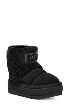 Genuine shearling spill seams and a chunky platform sole bring a fashion-forward look to this updated version of UGG's beloved classic boot. It's lined with UGGplush, a moisture-wicking textile made from a wool-rich blend but crafted to feel and wear like genuine shearling, while the sole is sourced from renewable sugarcane. 1 1/2" platform (size 11) 6 3/4" shaft Water-repellent Leather and genuine shearling upper/UGGplush wool-blend lining/synthetic sole Shearling may be sourced from Australia, Black Shearling Boots For Fall, Black Platform Boots With Faux Fur Lining, Winter Black Shearling Boots, Clothes Reference, Cold Weather Boots, Weather Boots, Ugg Classic, Classic Boots, Chunky Platform