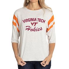 Elevate the style of your game day tee with this Virginia Tech Hokies Sabrina Jersey T-shirt. It features the team name and logo accentuated by contrast-color side stitching and sleeve stripes. A rounded hem gives this Virginia Tech Hokies shirt a more comfortable fit and feel. Collegiate Athletic Heather Tops For Game Day, Game Day Tops In Athletic Heather, Collegiate Style Tops In Athletic Heather For Game Day, Game Day Pre-shrunk Athletic Heather Tops, Collegiate Athletic Heather Tops For Sports Events, Athletic Heather Sports Fan Top For Game Day, Athletic Heather Tops For Sports Fans On Game Day, Collegiate Athletic Heather Tops For Fan Gear, Varsity Style T-shirt For Game Day