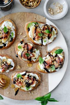 an overhead view of breads with various toppings