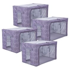 four purple storage boxes with white circles on them