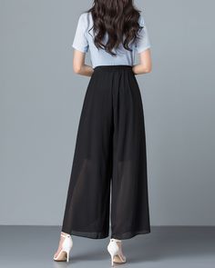 * Wide-leg skirt-shaped pants spun with high-quality chiffon fabric. * Elastic waistband and A-line shape, make you look more taller and thinner. *Material: 100% chiffon *Let us know your regular size and overall height in your country. *The waist size and length can be customized. *Size: True to US size, can provide US 0 to US 20 , you can tell us your usual size and height when ordering. * Shipping: Free shipping Processing time: 5-7 working days Delivery time: 7-20 working days Black Summer Ankle-length Culottes, Black Wide-leg Summer Culottes, Black Elastic Waistband Culottes For Spring, Black Wide-leg Culottes For Summer, Black Dress Pants Loosely Fitted For Spring, Black Dress Pants With Loosely Fitted Hips For Spring, Black Dress Pants With Elastic Waistband For Spring, Spring Pants With Wide Waistband In Black, Black Full-length Summer Dress Pants