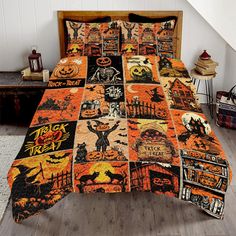 a bed covered in halloween themed quilts and pillows