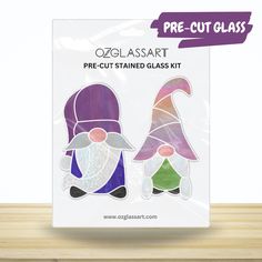 the glass cutting kit is designed to look like two gnomes