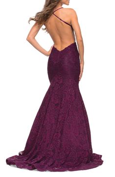 Set your style to stun when you arrive in this mermaid gown cut from glimmering stretch lace and styled with a slightly sheer bodice and a strappy back. 60" length Hidden back-zip closure Scoop neck Adjustable straps Lined 100% polyester Spot clean Imported Fitted Evening Dress With Strappy Back Opening, Backless Gown With Lace-up Back And Fitted Bodice, Elegant Dresses With Lace-up Back And Back Strap, Fitted Evening Dress With Strappy Back For Prom, Fitted Strappy Back Evening Dress For Prom, Fitted Dress With Corset Back And Back Strap, Prom Mermaid Dress With Fishtail And Back Opening, Backless Mermaid Dress With Back Opening, Prom Mermaid Dress With Back Opening