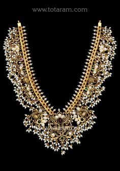 22 Karat Gold "Peacock / Guttapusalu" Necklace for Women with Cz, Beads, Pearls & Japanese Culture Pearls - 235-GN4480 - in 124.200 Grams for USD $9011.15. 
Made in India by Totaram Jewelers Online this product is in Gold - 22 Karat BIS Hallmark 916 KDM Gold  & is an excellent gift for Adult - Women. Ships fully insured with secured guaranteed delivery for free with your order over $250 from New Jersey USA & comes with 30 days exchange policy. 22k Gold Kundan Necklace For Reception, 22k Gold Temple Jewelry Kundan Necklace For Reception, 22k Gold Kundan Necklace For Reception In Temple Style, Gold Bridal Necklace With Peacock Design For Reception, Gold Necklace With Peacock Design For Receptions, Festival Reception Kundan Necklace With Peacock Design, 22k Gold Kundan Necklace With Peacock Design For Celebration, Celebration 22k Gold Kundan Necklace With Peacock Design, 22k Gold Peacock Temple Necklace