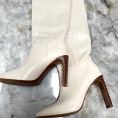 Popular Sold Out White Leather Boots. Brand New, Never Worn. 100% Leather. Tall Leg. Rounded Toe. Rectangular Heel. Inner Lining. 3.94 In Heel. White Faux Leather Heeled Boots With Round Toe, White Leather Heeled Boots With Wide Calf, White Leather Wide Calf Heeled Boots, White Leather Heeled Boots For Wide Calf, Chic White Knee-high Heeled Boots, White Almond Toe Heels In Faux Leather, White Knee-high Work Boots, White Knee-high Workwear Boots, White Knee-high Boots For Work