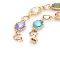 "READY TO SHIP ✈ Colorful Gemstones Bracelet, women Gold filled Bracelet, beautiful Boho chic Bracelet. This bracelet is a perfect birthday gift for your love / mom / girlfriend / granddaughter or just for yourself. Features: * Handmade * Gold filled * Bracelet length is about: 7.5\" (19 cm) - Can be customized to fit you perfectly! Please send me a message with your size. See more Bracelets in my shop - http://etsy.me/2sZGhZe See more Birthstone Jewelry in my shop - http://etsy.me/2FDHOXh See m Elegant Multicolor Birthstone Bracelets, Elegant Multicolor Birthstone Bracelet, Multicolor Gold Bracelet Gift, Spiritual Birthstone Crystal Bracelet, Birthstone Bracelets For Jewelry Making, Elegant Multicolor Charm Bracelet For Gift, Elegant Multicolor Charm Bracelet As Gift, Elegant Multicolor Charm Bracelet Gift, Bracelet Women Gold