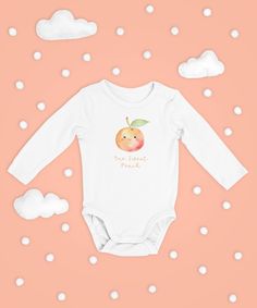 This absolutely adorable One Sweet Peach long sleeve bodysuit will be the perfect outfit for your daughter's peach-themed first birthday party! Match this with our One Sweet Peach wrapping paper and velveteen blanket (sold separately) for perfect coordinated photo shoot.  The infant long sleeve bodysuit is made of 100% smooth cotton fabric, which will be soft against the young one's delicate skin.  Even better - we have matching One Sweet Peach items to make your little one's party perfectly coo Cute White Long Sleeve Bodysuit, Long Sleeve Onesie For Birthday, White Long Sleeve Onesie For First Birthday, White Long Sleeve Onesie For Birthday, Pink Long Sleeve Romper For First Birthday, One Sweet Peach, Themed First Birthday, Cute Peach, Cowgirl Gifts