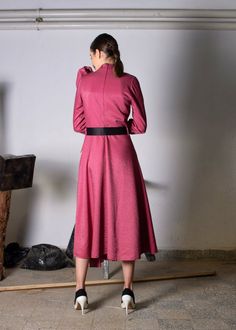 Flowy, asymmetrical cut midi dress with side tie detail, and elastic black belt detail at waist (fabric: viscose/ polyester blend) Belted Midi Dress For Party, Midi Dress With Tie Waist, Pink Belted Midi Dress For Party, Pink Asymmetrical Midi Dress, Asymmetrical Pink Midi Dress, Evening Knee-length Dress With Tie Waist, Elegant Pink Maxi Dress With Asymmetrical Hem, Pink Belted Dresses For Evening, Pink Belted Evening Dresses