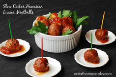 four small plates with meatballs in sauce and toothpicks sticking out of them