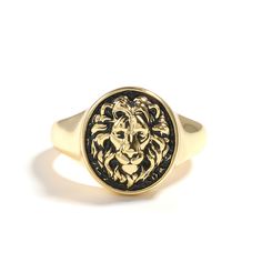 The powerful Lion represents unrivaled courage and strength. This strong beautifully detailed lion ring is unique in his kind, handcrafted in detail. Cut into a classic sovereign shape and finished with sterling silver, this design is a must-have for any executive boss. This ring features a lion motif in an antique gold tone. Update your collection with this fashion ring.Weight: 5.18 gWidth: 3.4 mmHeight: 5.7 mmThickness: 1.4 mmMaterial: 925 SilverPlating Color: Yellow Gold Boss Ring, Jeulia Jewelry, Artistic Earrings, Extraordinary Jewelry, Sterling Silver Mens Rings, Mens Silver Rings, Ring For Men, Themed Jewelry, Sterling Silver Mens